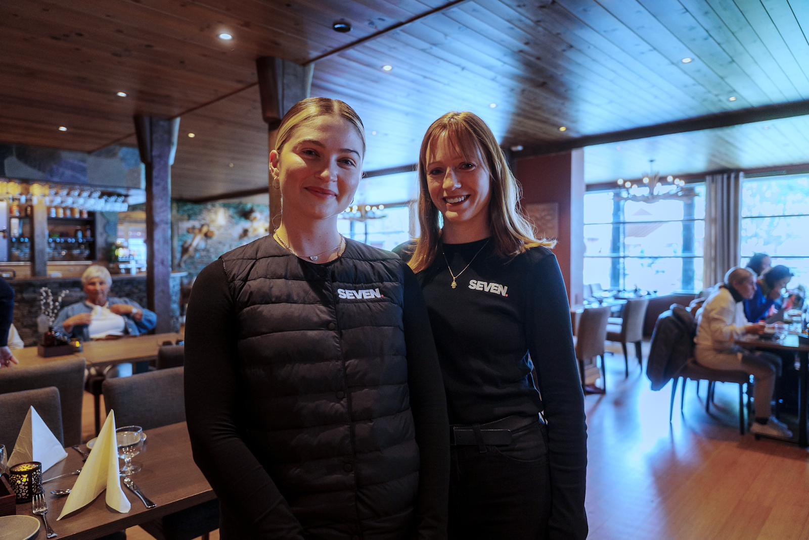 Two women standing in a room

AI-generated content may be incorrect.